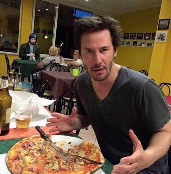 keanu reeves eating pizza