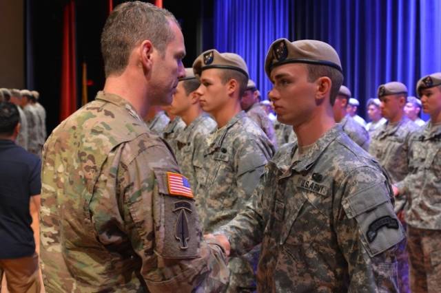 Like father, like son. Pvt. Howard Urban is congratulated by his father Sgt. Maj. Howard Urban at the 75th Ranger Regiment RASP Class 05-15 Graduation at Fort Benning.