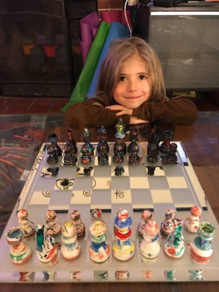 “My daughter decorated a chess set for me as a gift, and played her first game with me tonight...”