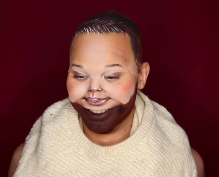 funny pics and memes - Black man wearing a creepy dolls head as a mask