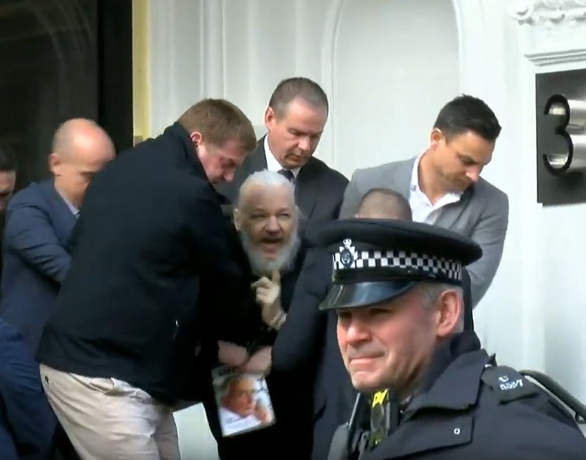 julian assange being arrested