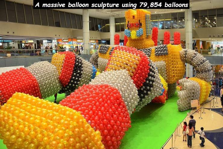 tan lily balloon - A massive balloon sculpture using 79,854 balloons