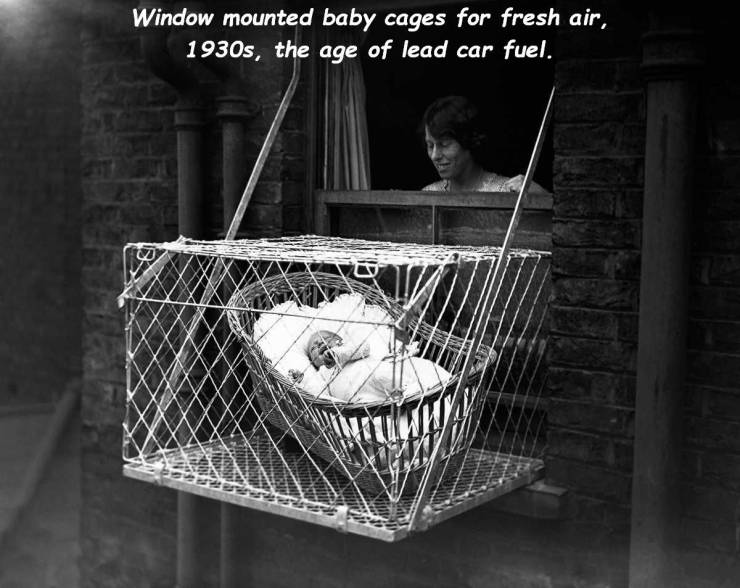 baby cages window - Window mounted baby cages for fresh air, 1930s, the age of lead car fuel.