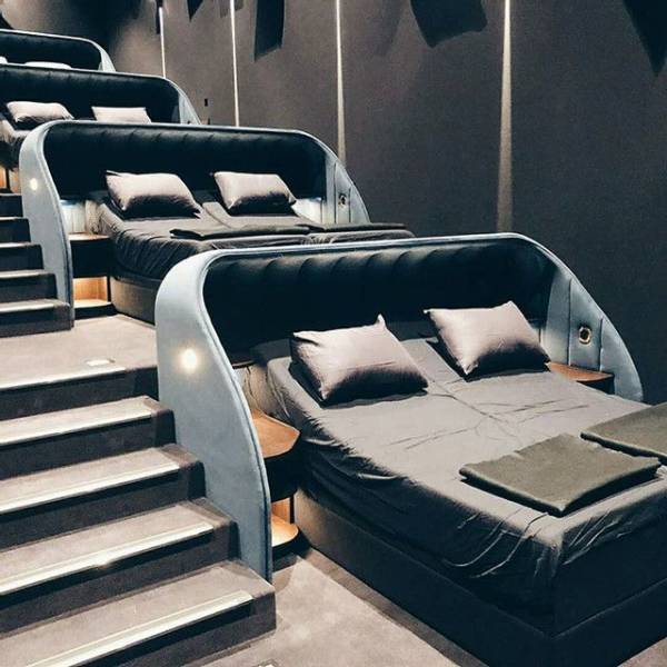 cool random pics - cinema with beds -