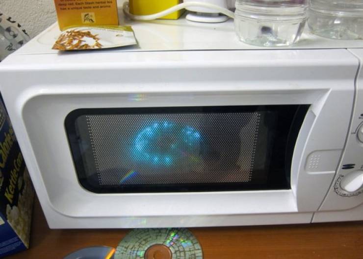 microwave above refrigerator