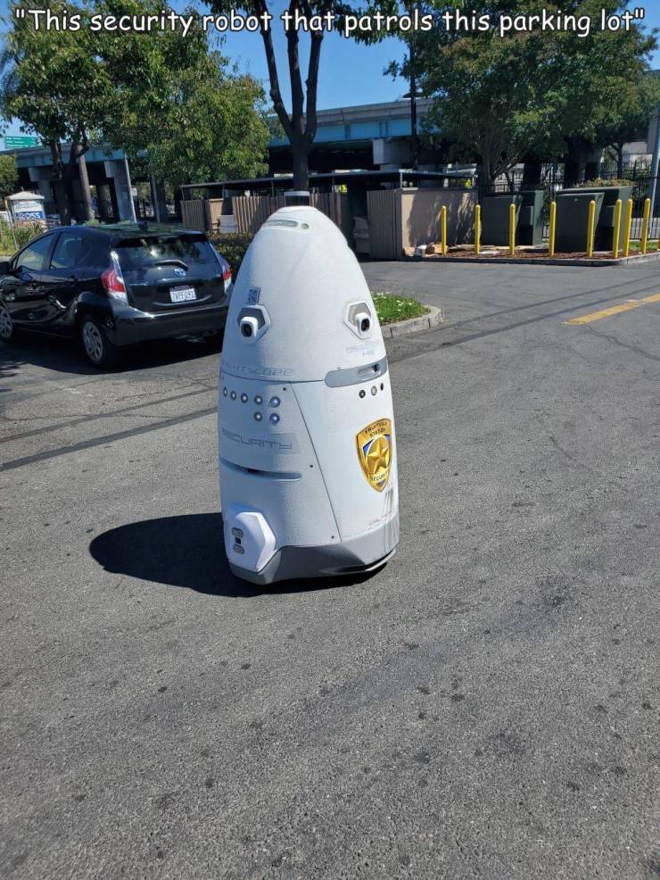 random pics and cool photos - asphalt - "This security robot that patrols this parking lot" Tee ! oo