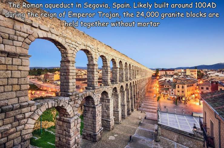 aqueduct of segovia - The Roman aqueduct in Segovia, Spain. ly built around 100AD during the reign of Emperor Trajan, the 24,000 granite blocks are held together without mortar