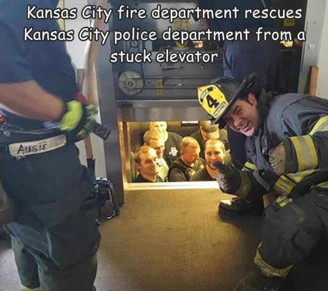 funny randoms - cool photos - kansas city fire department saves police - Kansas City fire department rescues Kansas City police department from a stuck elevator Ausje