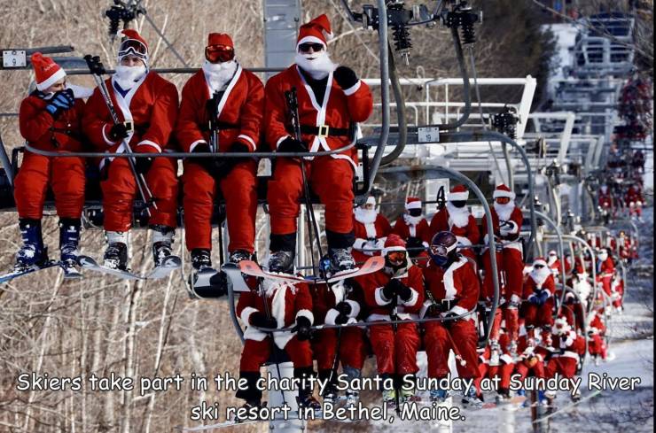 Sunday River Resort - Skiers take part in the charity Santa Sunday at Sunday River ski resort in Bethel, Maine.
