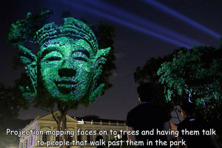 fun randoms - tree - Projection mapping faces on to trees and having them talk to people that walk past them in the park