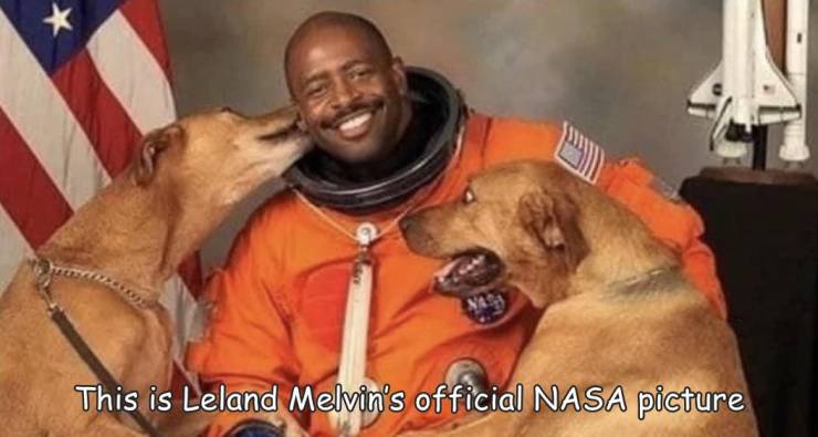 fun randoms - nasa astronaut with dogs - This is Leland Melvin's official Nasa picture