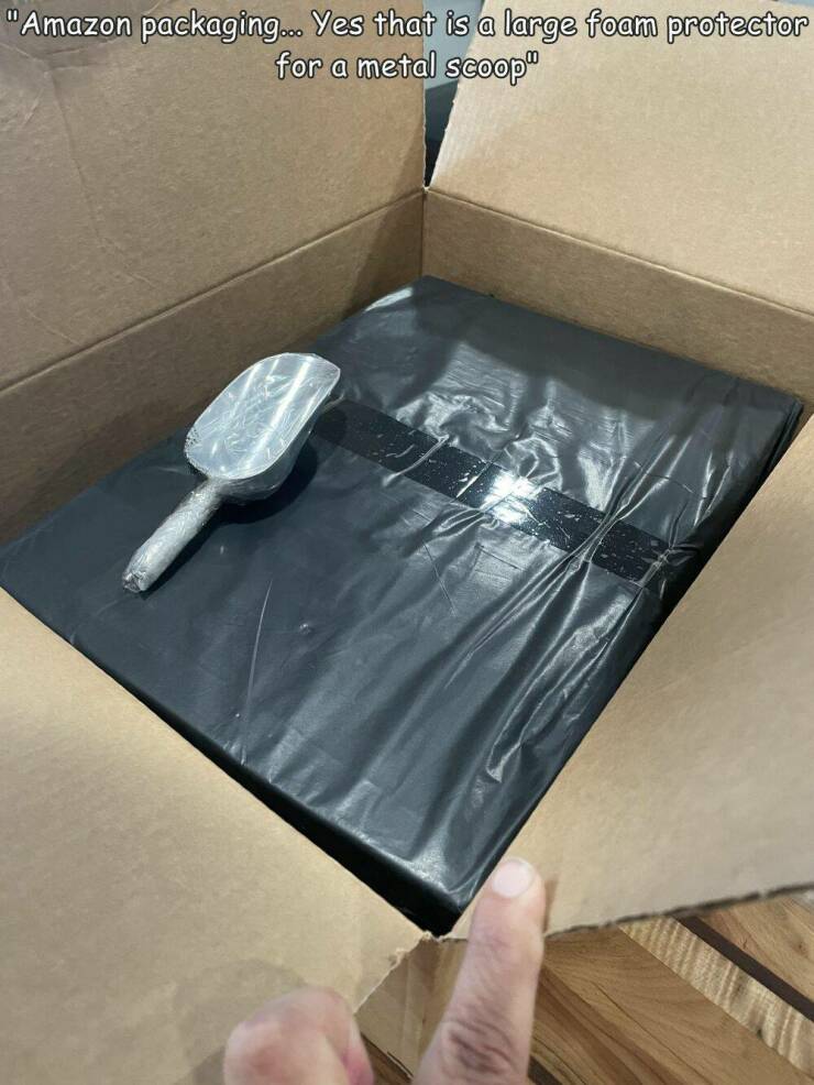 fun randoms - floor - "Amazon packaging... Yes that is a large foam protector for a metal scoop"