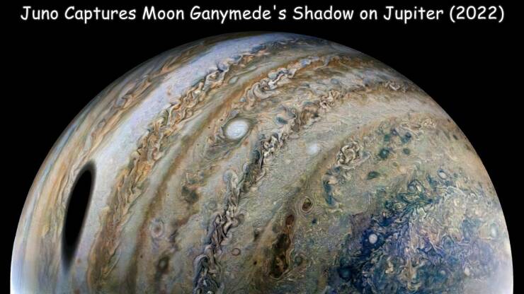 fun randoms - funny photos - Jupiter - Juno Captures Moon Ganymede's Shadow on Jupiter 2022