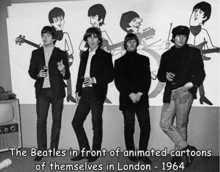 fun randoms - beatles animated - Na. The Beatles in front of animated cartoons of themselves in London 1964