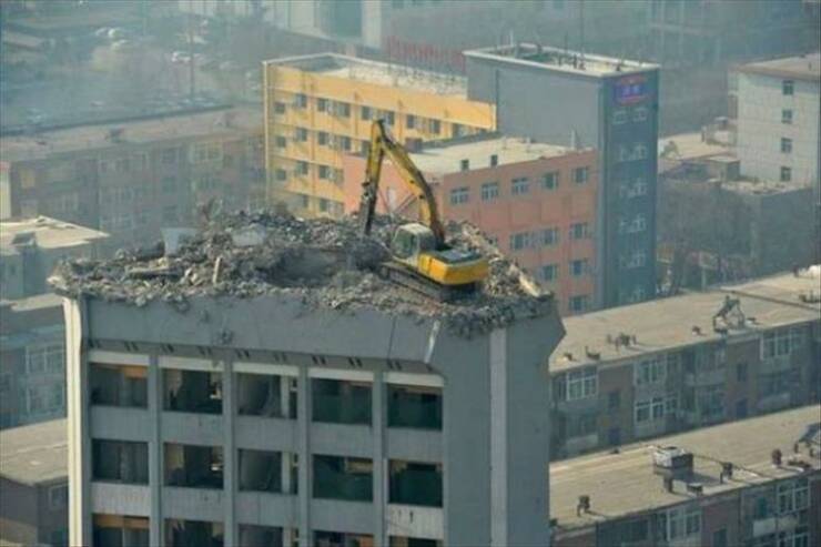 cool pics and random photos - bulldozer on top of building - 30 2 33
