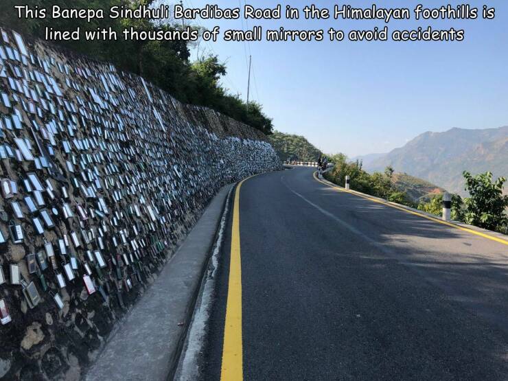 cool random pics - mulkot sindhuli - This Banepa Sindhuli Bardibas Road in the Himalayan foothills is lined with thousands of small mirrors to avoid accidents
