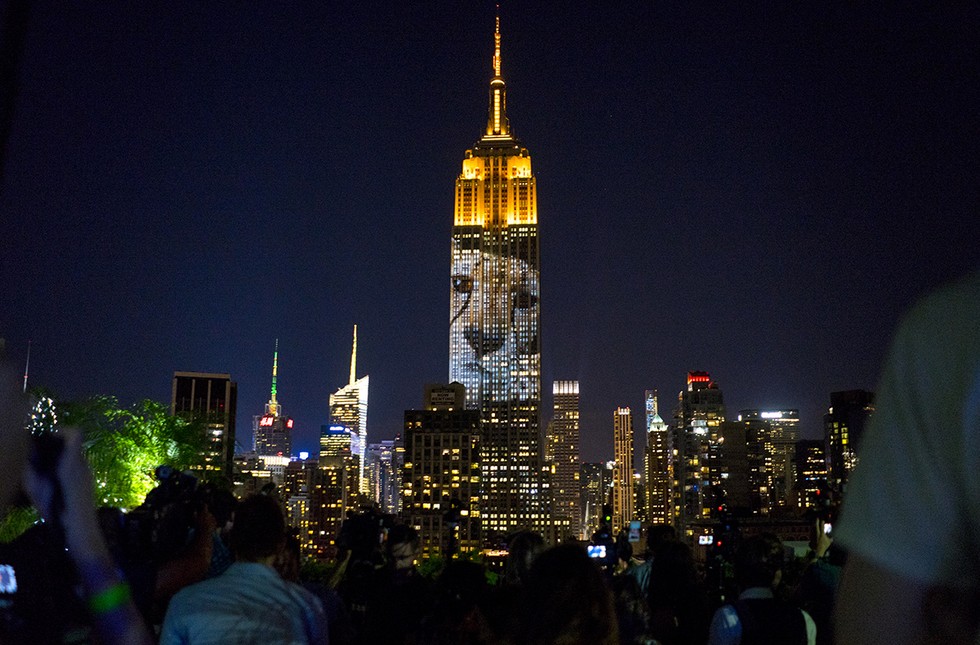The projections drew crowds across Manhattan.