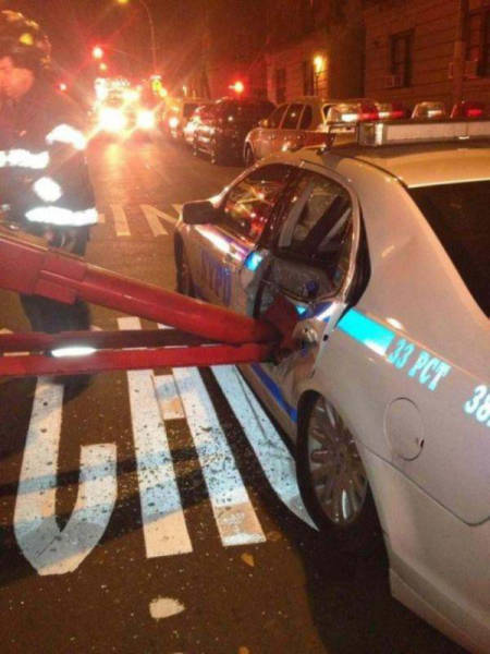 fdny crushes nypd car - 33 Pct 30