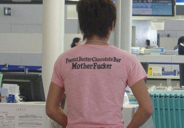 Asians Wearing Shirts With American Writing