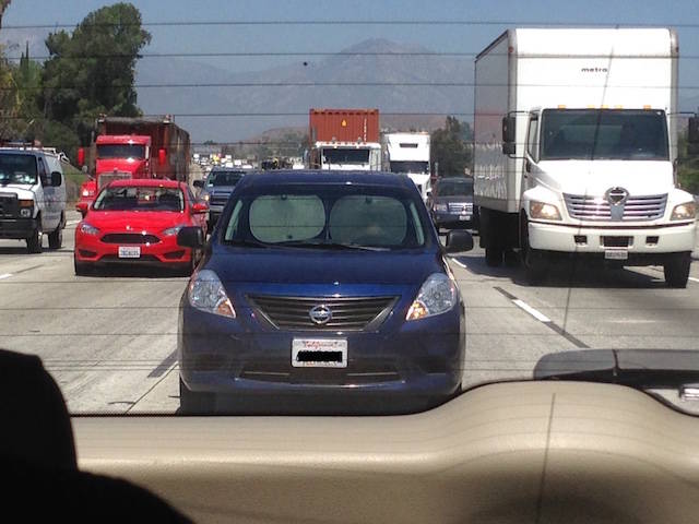 man driving freeway