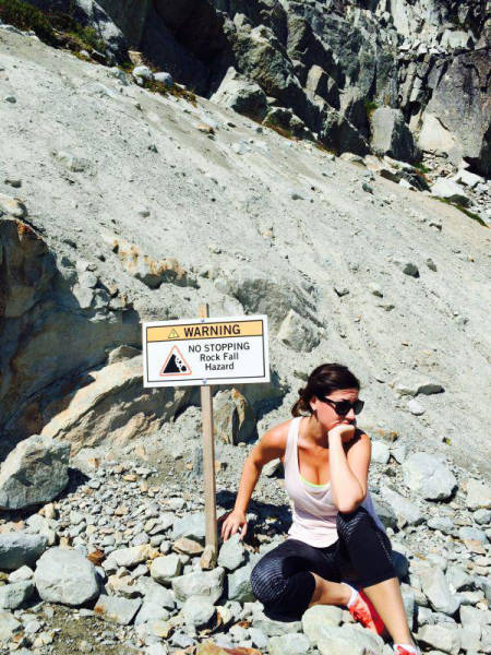 girl - Warning No Stopping Rock Fall Hazard