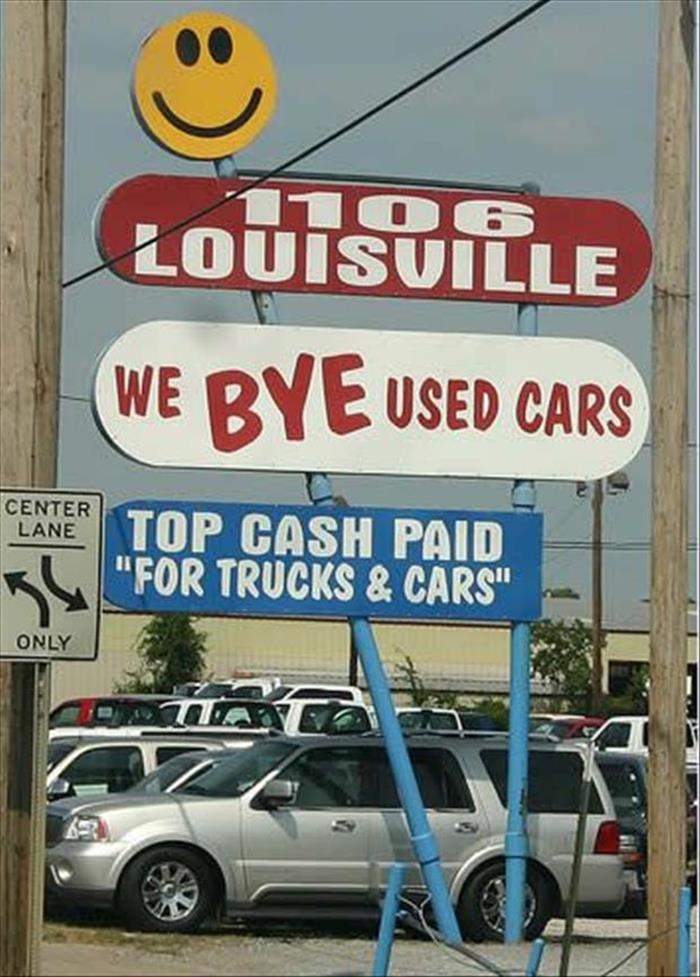 misspelled signs - Louisville We Bye Used Cars Center Lane Top Cash Paid "For Trucks & Cars" Only
