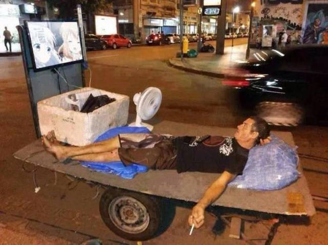 homeless guy watching anime -