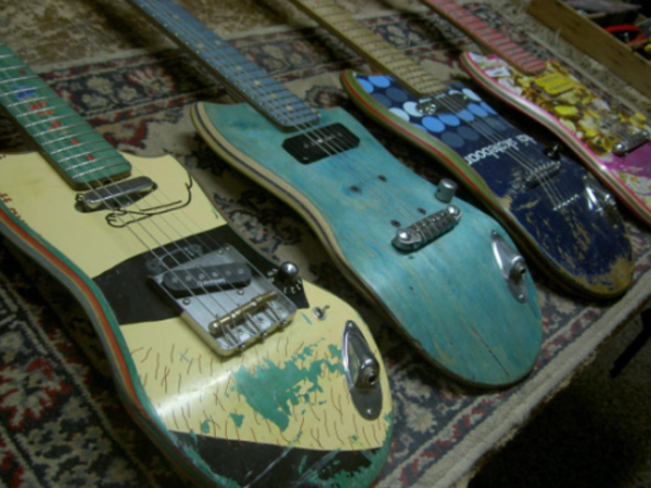Awesome guitars made out of old skateboards.