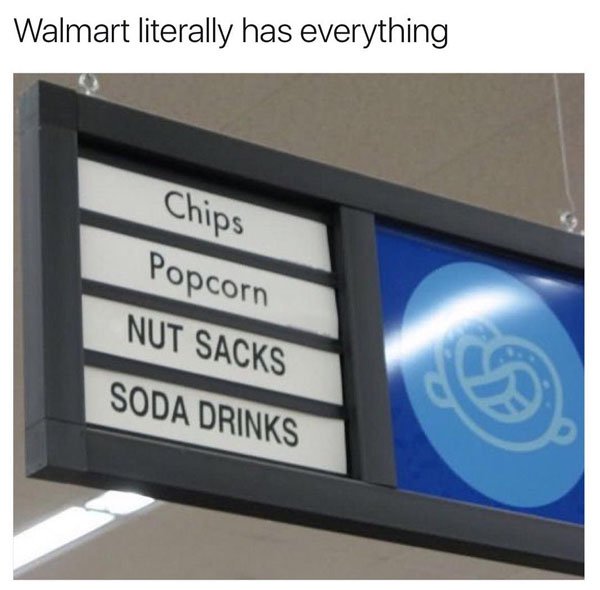 Walmart isle that has chips, popcorn, nut sacks and soda drinks.