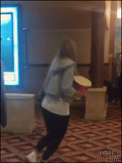 woman falling over tripping fail gif