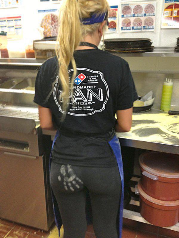 woman working at domino's pizza with handprint on her butt