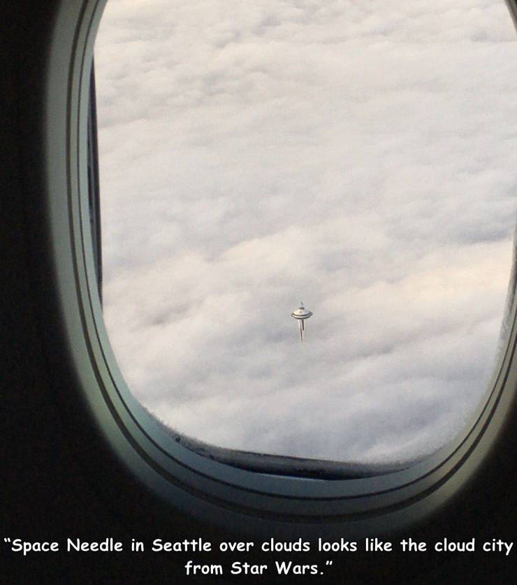 space needle in seattle over clouds looks like the cloud city from star wars