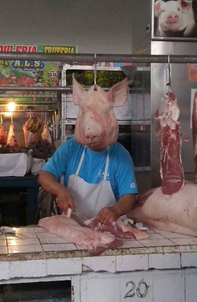funny butcher wearing pig's head