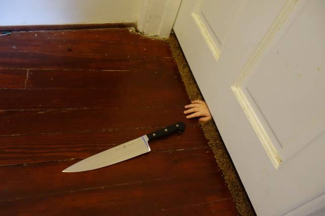 knife under door