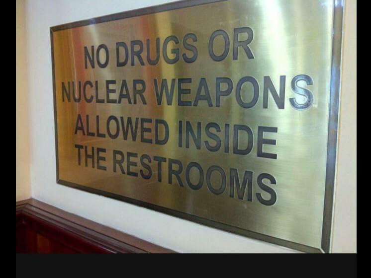 sign - No Drugs Or Nuclear Weapons Allowed Inside The Restrooms