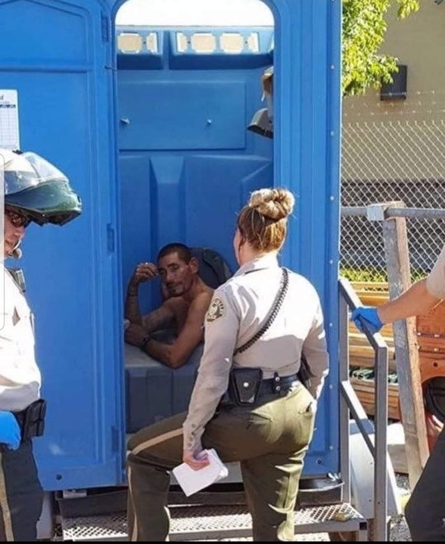 man stuck in porta potty