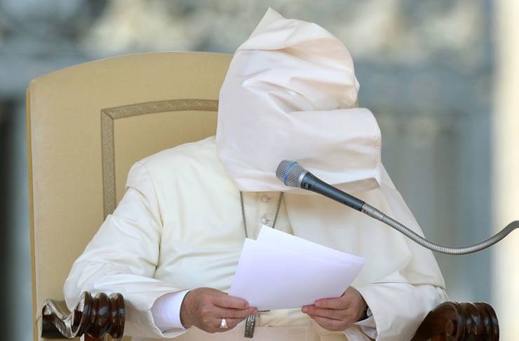 funny pics - pope reading script with bag on his face