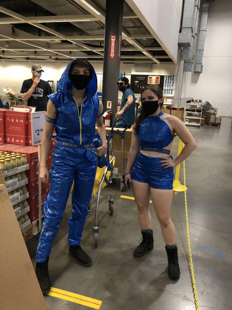 funny pics - ikea coworkers wearing ikea blue bags