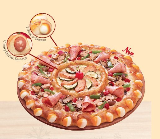 Pizza Hut's "Double Sensation", Singapore.  Yes that is a cherry on top!