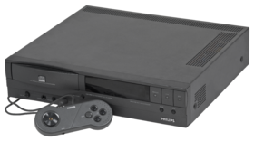 Phillips CD-i 1991 - Developed to provide more functionality than a CD player or game console but at a lower price than a computer, this console was initially priced at 700.  It was notably the first console to use online gaming features such as web browsing, email, online play, and subscriptions.