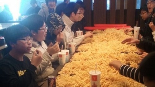 This is a picture from a "potato party," the latest weird craze that's been sweeping across Korea and Japan which involves going to a McDonald's restaurant and feasting on an absurd amount of french fries right then and there. Earlier last week, several South Korean adolescents were reportedly booted from McDonald's for potato partying.