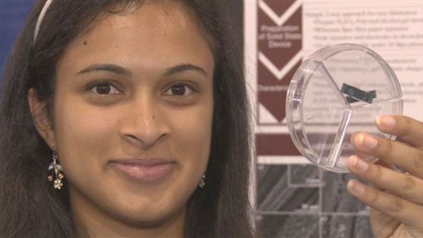 Shown holding super-capacitor device that can supercharge a cell phone to full charge  in 20-30 seconds. She won top $50,000 prize at  the Intel International Science and Engineering Fair in Phoenix, Ariz