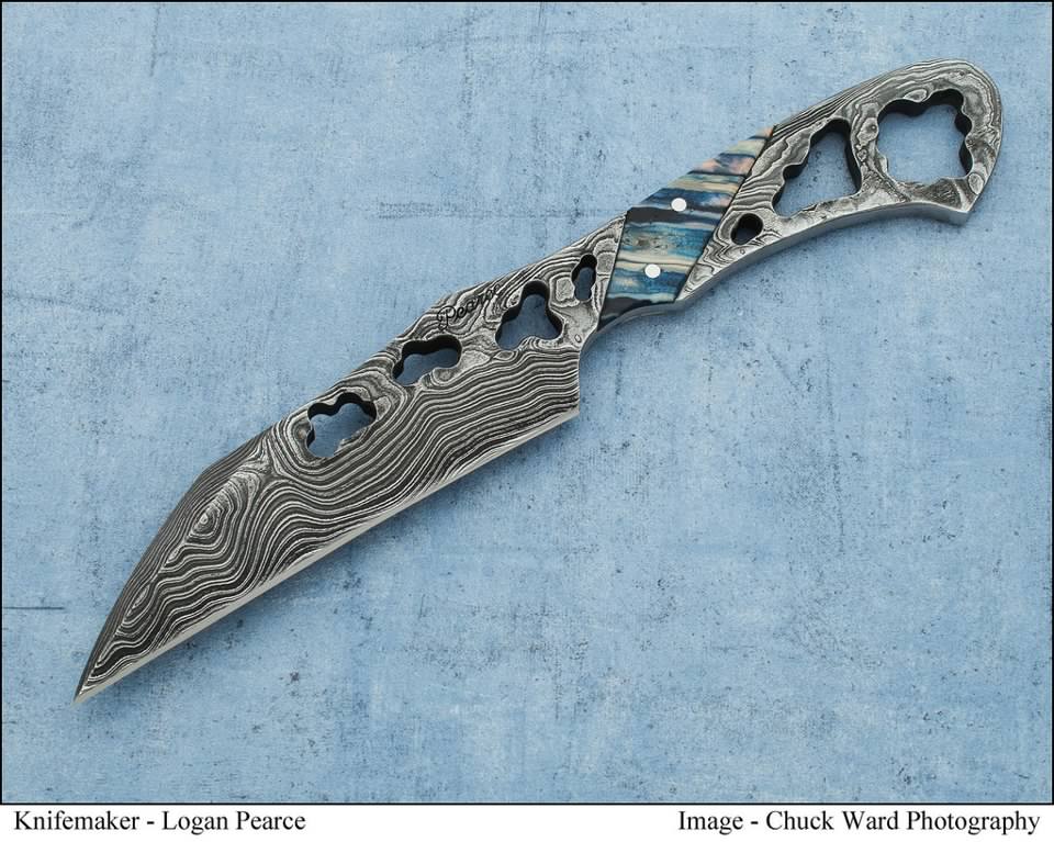 pierced knife by Logan Pearce with mammoth ivory and damascus