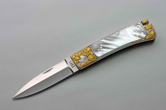 folder by Ron Lake. that duck is 18k gold.