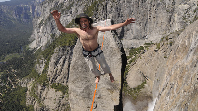 Hans Zak is a famous daredevil who's routine typically involves walking a tightrope between extremely tall structures like you see in this picture of Yosemite Park.