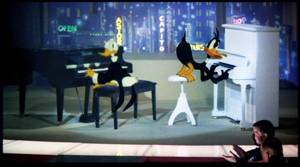 All The Ducks in One SceneWho Framed Roger Rabbit was the first time Warner Brothers and Disney characters appeared together on screen. Warner Brothers insisted Bugs Bunny and Daffy Duck got the same amount of screen time as Mickey Mouse and Donald Duck, this is why they always appear in the same scenes together.
