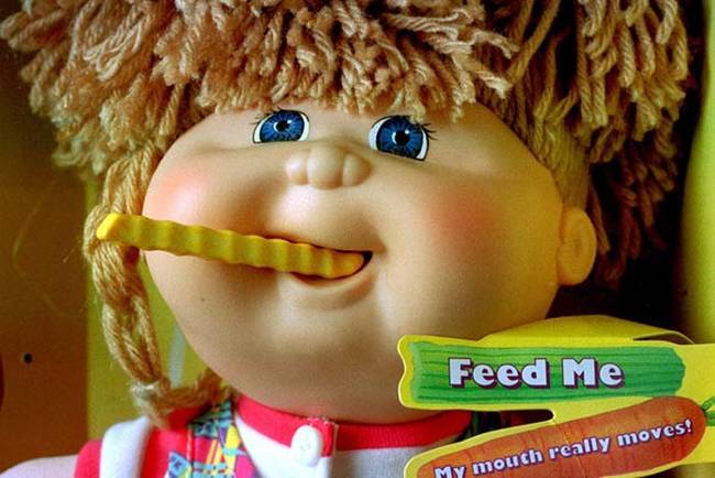 The Snacktime Cabbage Patch Kid "ate" pieces of plastic food by using a motor in its mouth. However, the doll didn't eat just the plastic pieces of food that came with it, and on multiple occasions, it would try to eat fingers and hair of their human owners. Mattel issued a voluntary recall not long after.