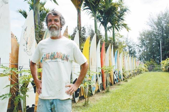 Donald Dettloff has almost 650 different surfboards and displays them in what is known as the "surfboard fence."