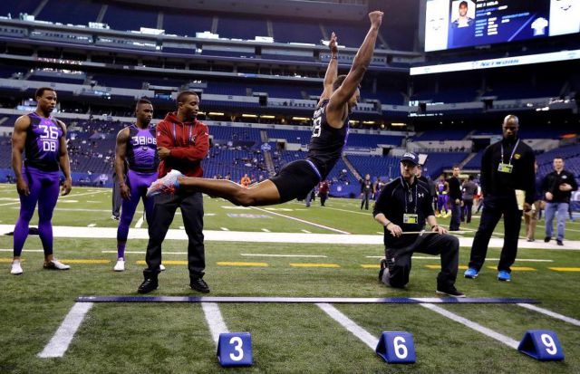 Byron Jones breaking the NFL Combine broad jump record by 8 inches