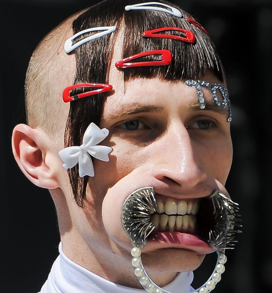 Photo from Hood By Air Spring 2016 menswear collection, showing a model with a mouth piece in his mouth